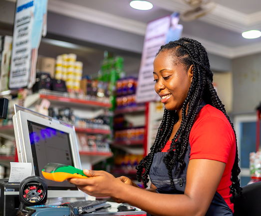 customer using her credit card pay goods brought from supermarket